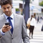 gty_man_texting_crossing_street_jt_150810_12x5_1600
